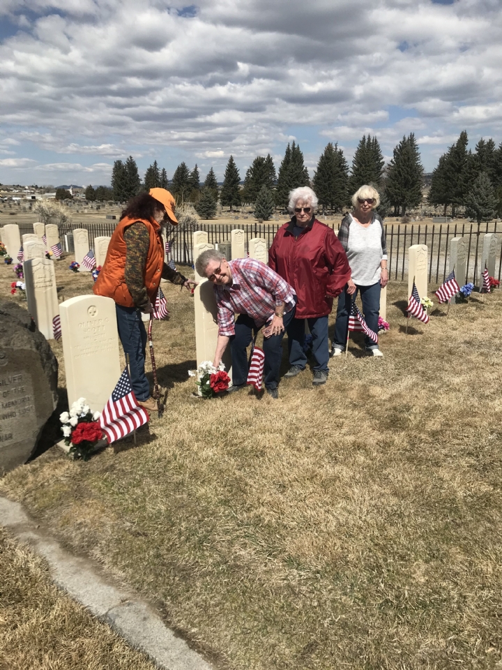 1448 Auxiliary members placed flowers on Spanish American graves in preparation for D.A.R. Re-dedication Ceremony